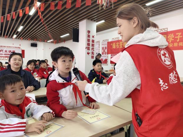 D:/Desktop/2026.3.21洪岗社区两项服务“绿书签暖雷锋情·书香浸润学子心”洪心少年主题活动/3.21（照片）/IMG_20260321_152518.jpgIMG_20260321_152518